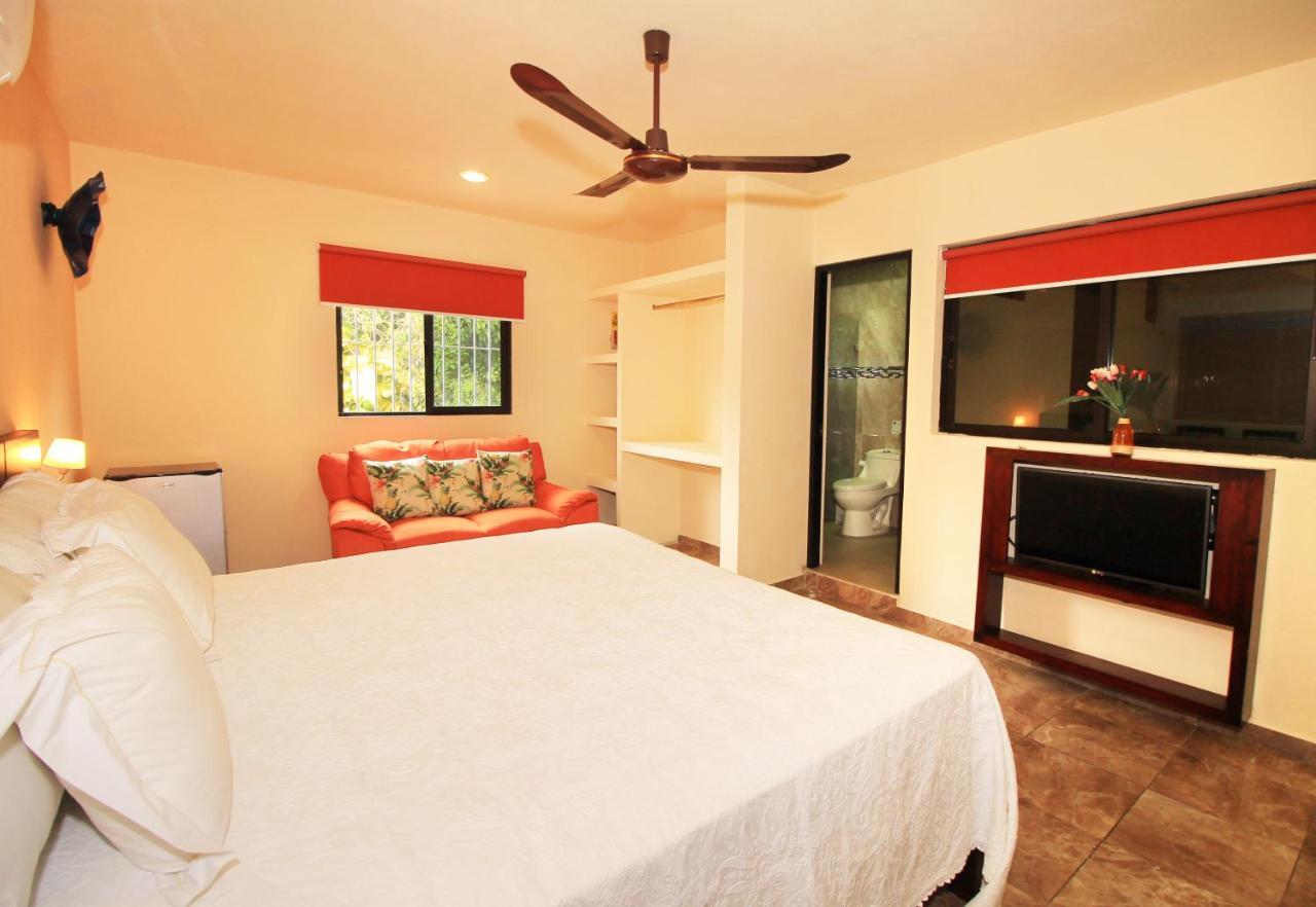 Papagayo Hotel Boutique Playa del Carmen Kültér fotó A bedroom at the hotel