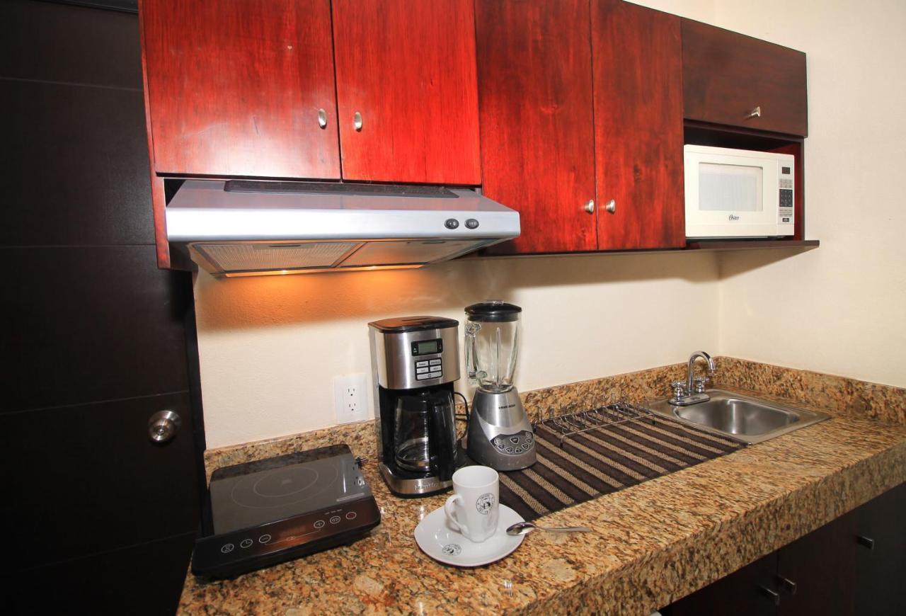 Papagayo Hotel Boutique Playa del Carmen Kültér fotó A coffeemaker in a kitchen