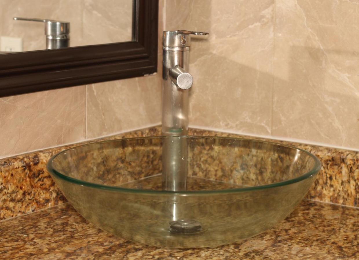 Papagayo Hotel Boutique Playa del Carmen Kültér fotó A vessel sink